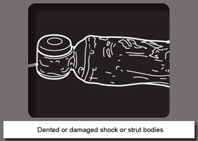 Dented or damaged shock or strut bodies